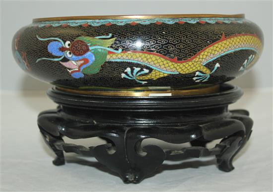 A Chinese cloisonne enamel dragon shallow bowl, Ming mark, early 20th century, diam.20.5cm, ebonised wood stand